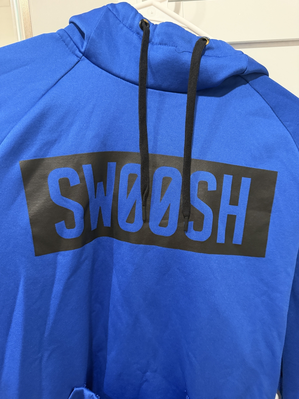 Men's Nike Blue Hoodie with Black Swoosh Graphic, Size Medium